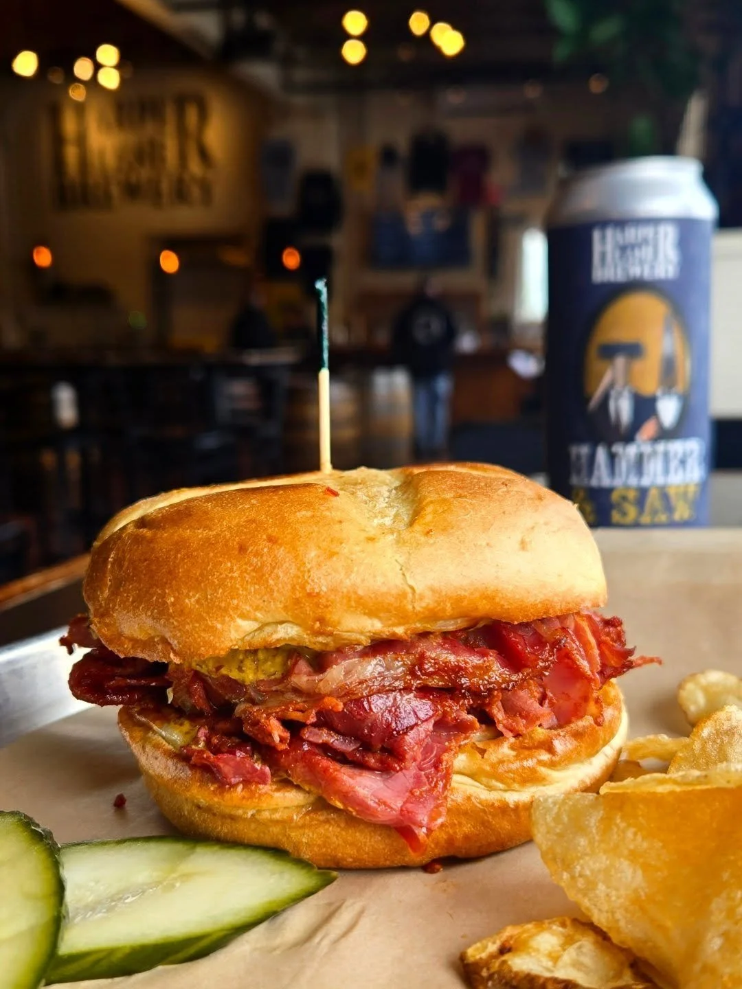 This Weeks Special from @homerootts!!

The OG Pastrami Sandwich is back!

Provolone cheese, diced pickles, red onion, beer mustard

Wash it down with our flagship-
Hammer &amp; Saw NEIPA- 6.5%