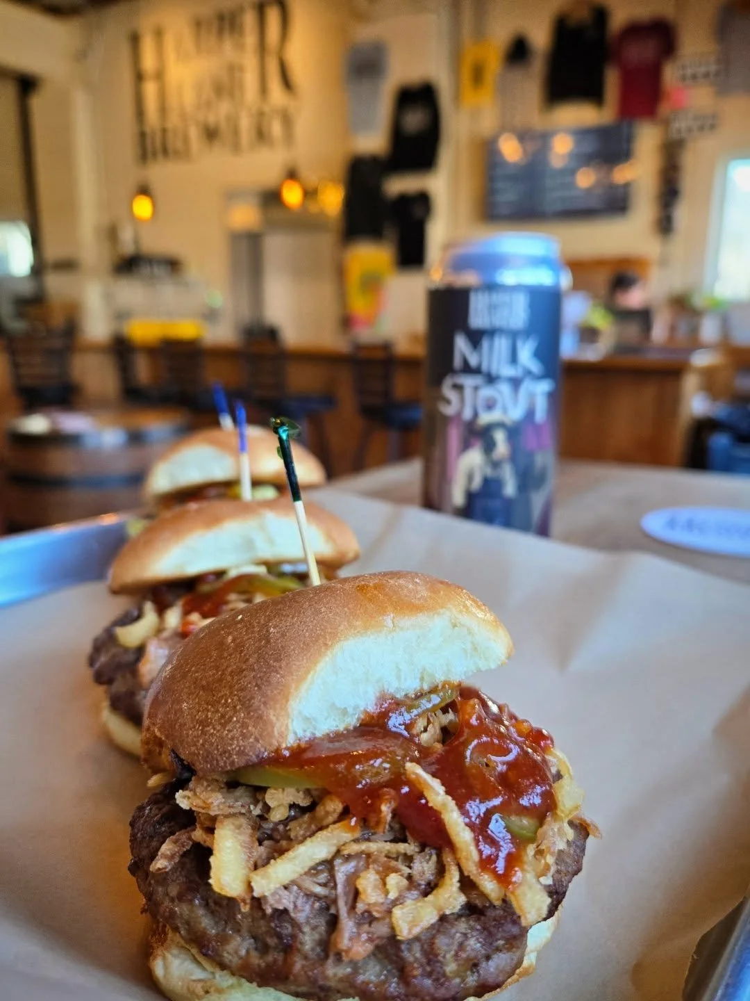 This Weeks Special from @homerootts!!

BB0 PORK BURGER SLIDERS

Seasoned burger sliders, bbq pulled pork, candied jalapenos, crispy onions, toasted brioche slider buns, choice of side.

Beer Pairing- Milk Stout- 6.1%