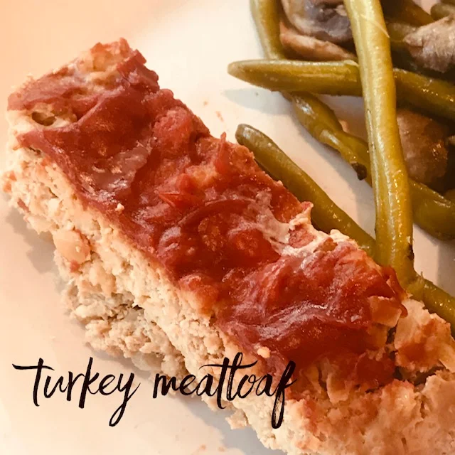 Recipe: 3 lbs ground turkey 2 large onions 2 tbsp. olive oil 1/2 tsp dried thyme 1/4 cup Worcestershire 1/2 cup chicken stock 1 tsp tomato paste 1 cup old fashioned oats 2 large eggs beaten Salt/pepper 1/2 cup ketchup 1. Heat oven to 325 degrees. 2. In sauté pan, cook onions, olive oil and thyme until onions translucent. Add the Worcestershire, chicken stock, and tomato paste and mix well. Allow to cool. 3. Combine turkey, oats, salt/pepper, and onion mixture in a large bowl. Mix well and shape into a rectangular loaf on an ungreased sheet pan. Spread ketchup evenly on top. Bake for 1.5 hours or until meatloaf is cooked through. A pan of hot water in the oven will keep the top from cracking! Macros: P- 29, F- 14, C-14 for 5 oz piece