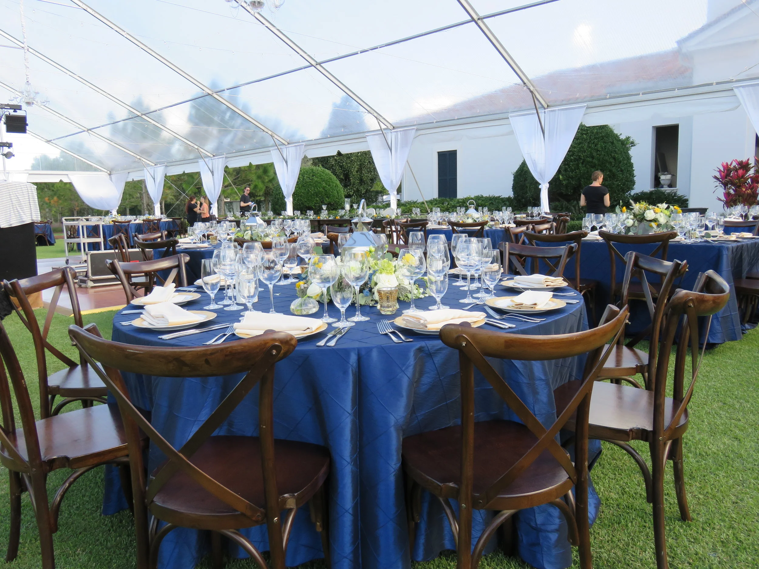 Table setting with rental chairs, and place settings