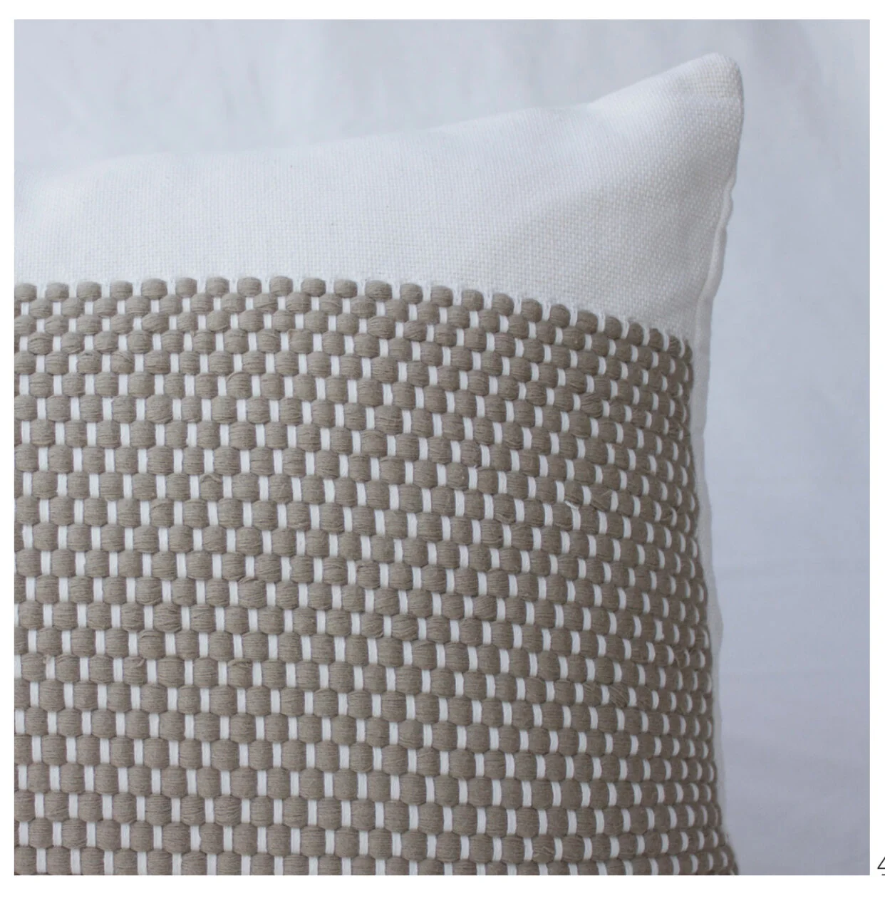 Brown dotted square pillow.