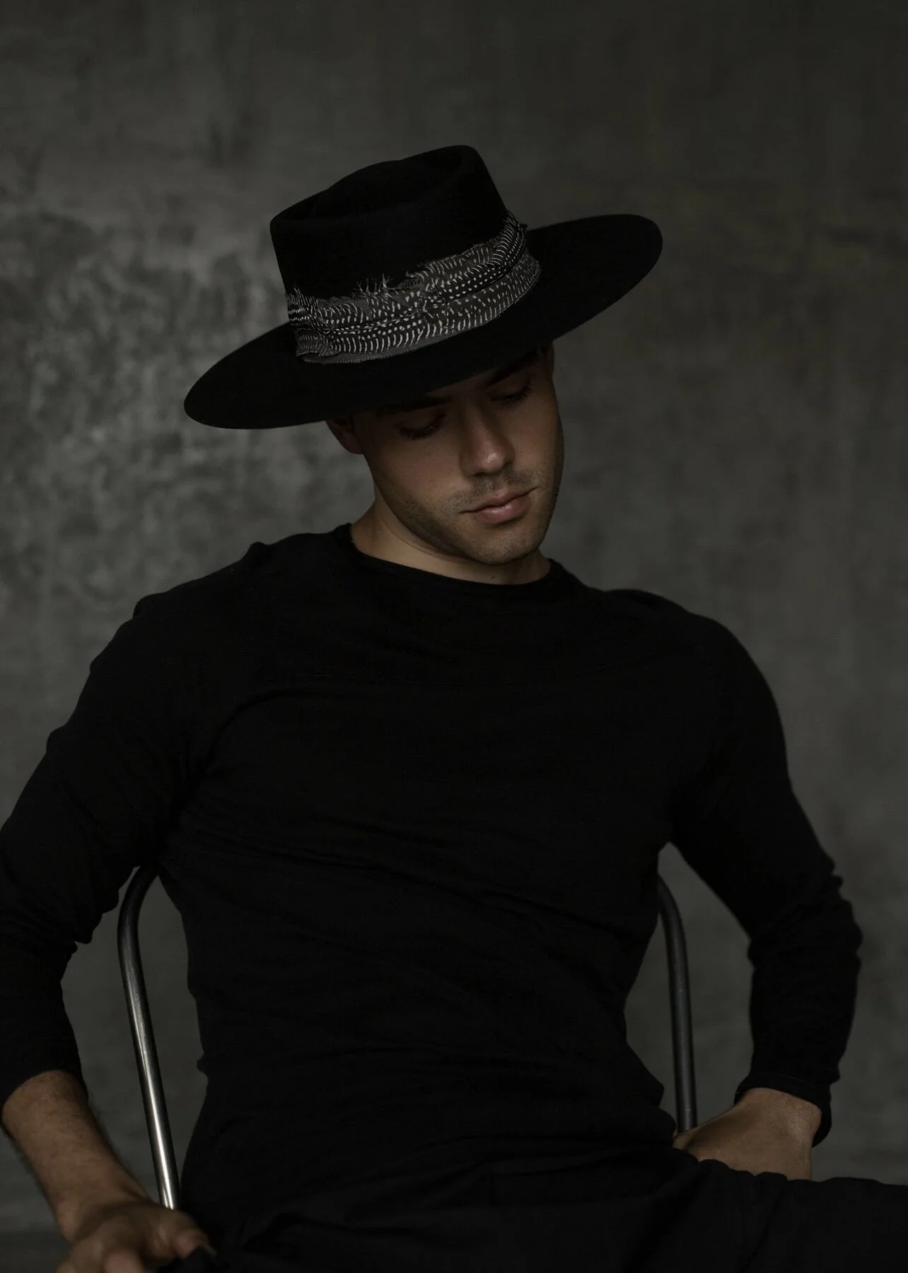 Man wearing black wool hat.