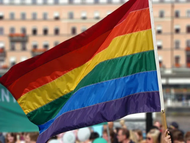 welcoming-prideflag-fauxblur.jpg