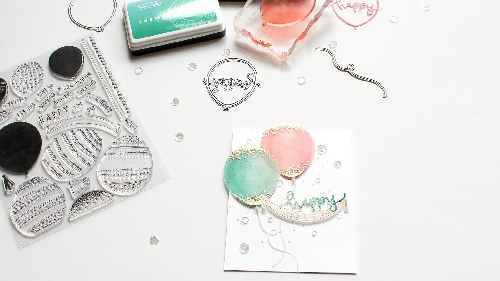  I also used another stamp included in the stamp set to create the beautiful confetti look on the top and bottom of the balloons. &nbsp;It looks beautiful embossed in the Rich Pale Gold embossing powder from Wow! 