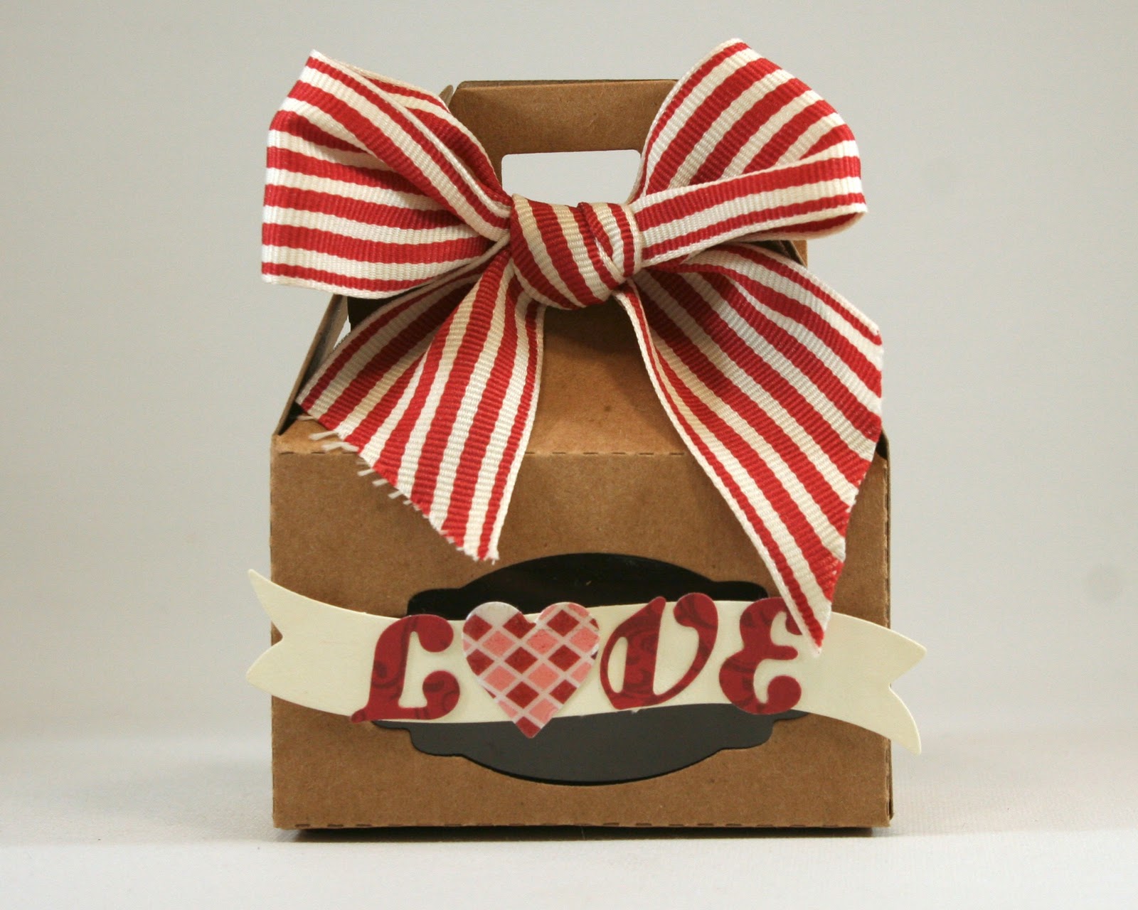 This project, using the Bakery Box Die, uses the other label shape included with the set to cut the window. I also used the Oh, Happy Day alphabet to spell out the word LOVE. (The heart is from the It Kits Release.)
