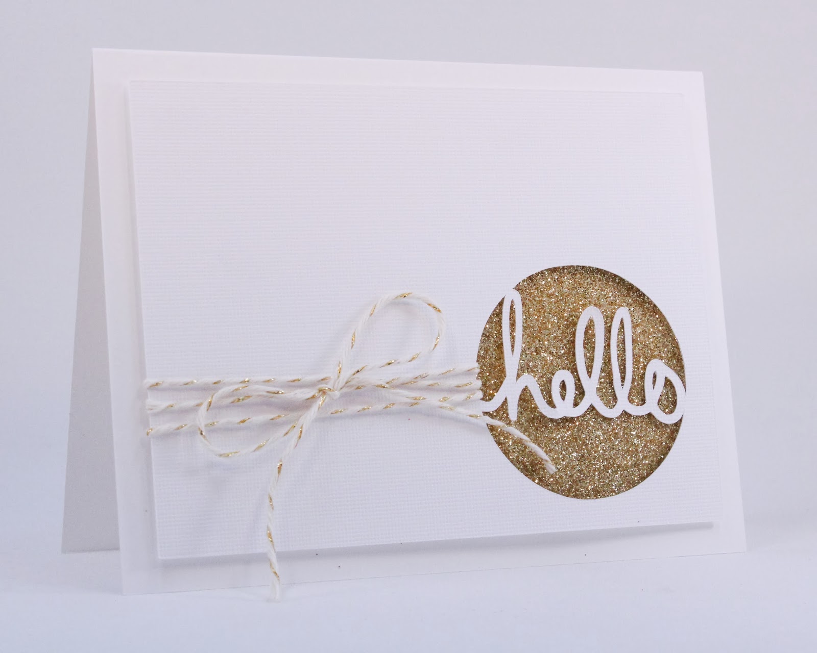  I used some glitter and twine to create this sparkly card.&nbsp;This one might be my favorite! 