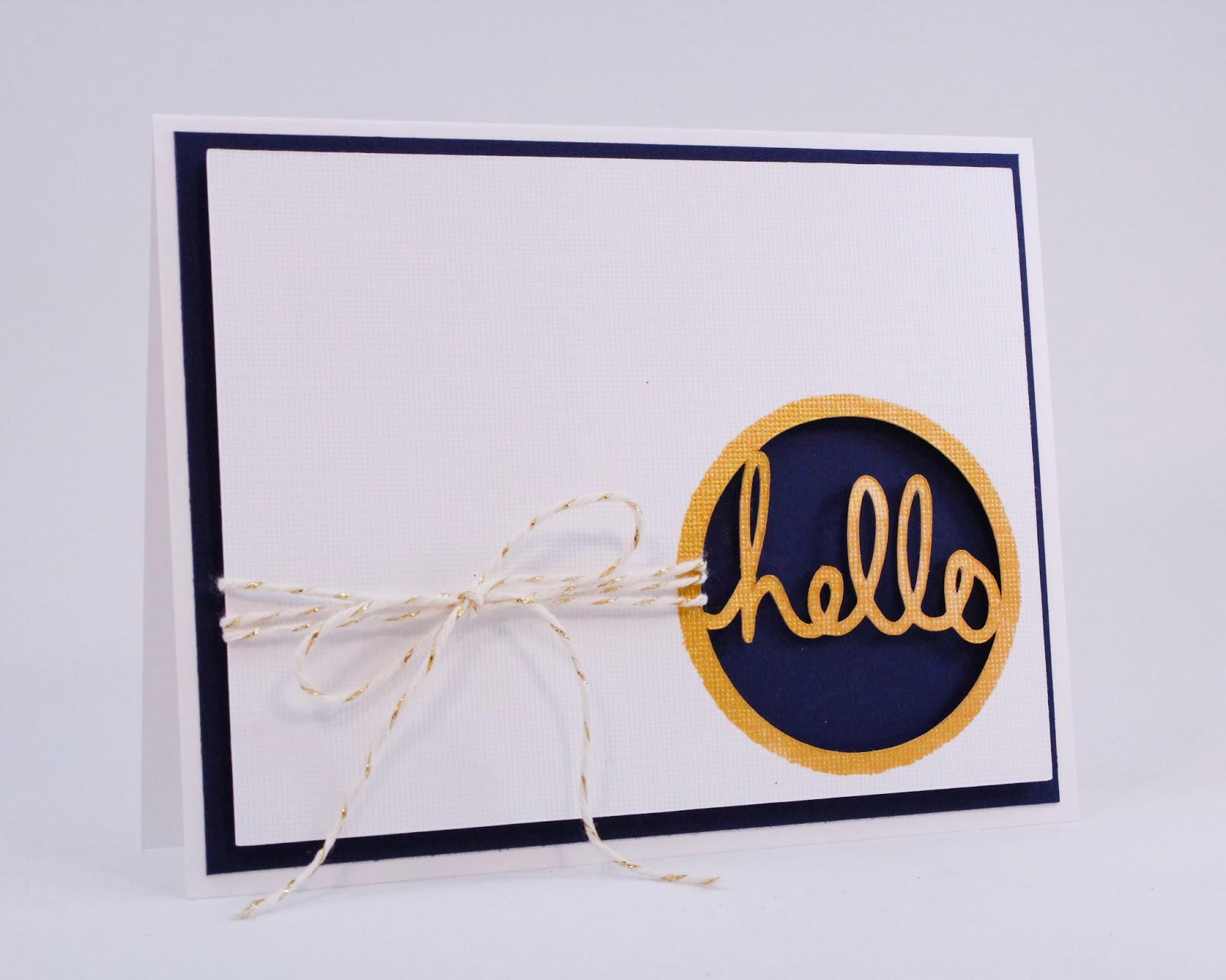 I used a mask and some gold ink to add color to just the hello and create a perfect gold border.