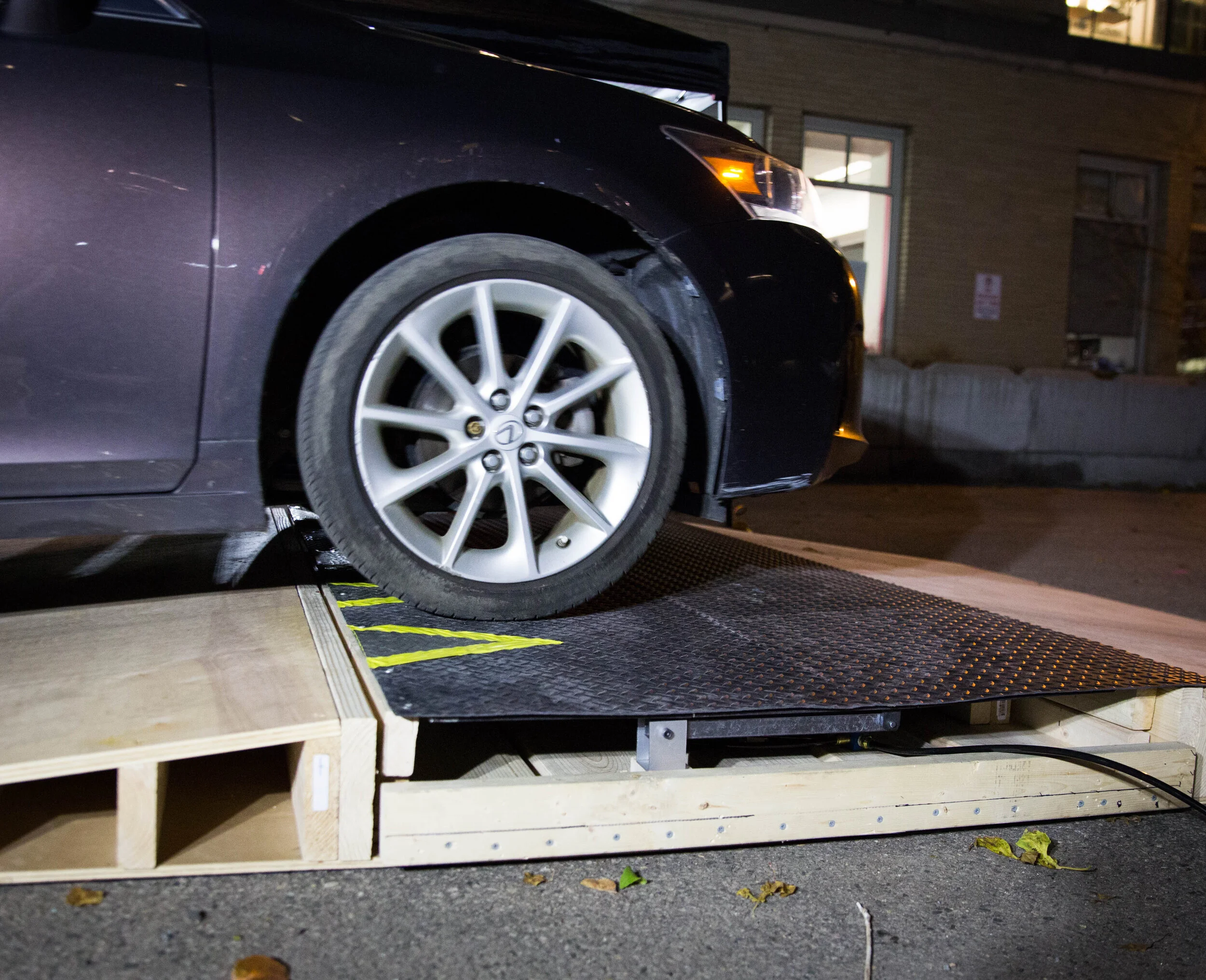 Collapsible speed bump under load