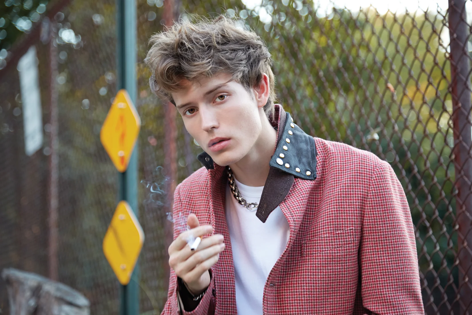 jacket, pants & t-shirt : SACAI necklace: A PEACE TREATY courtesy of Albright Fashion Library ring : AVOCET JEWELRY