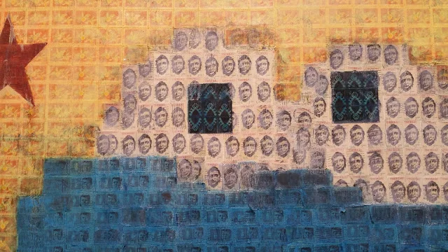 Thoreau provides the vision, dreaming of the unity of man , nature and heaven. The pupils made of 2¢ Navajo Jewelry stamps have a deeper darker perspective. On a field of 1976 O rchids from Vietnam, the field is orange, representing the Agent Orange that drenched the country.