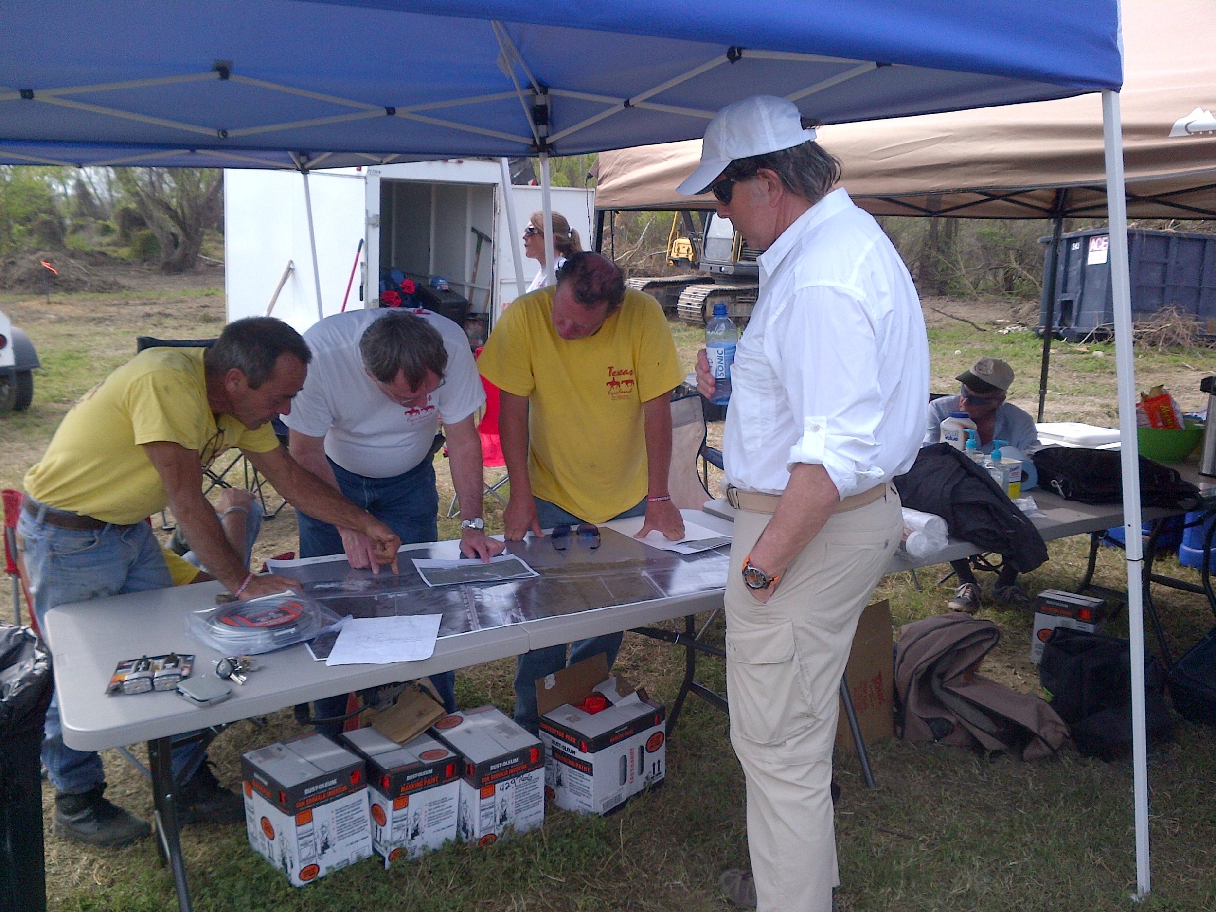 Under one of the tents set up in the March, 2013, Texas Equusearch dig for Gary Kergan's remains. Tim Miller, at left; Ted Kergan, right