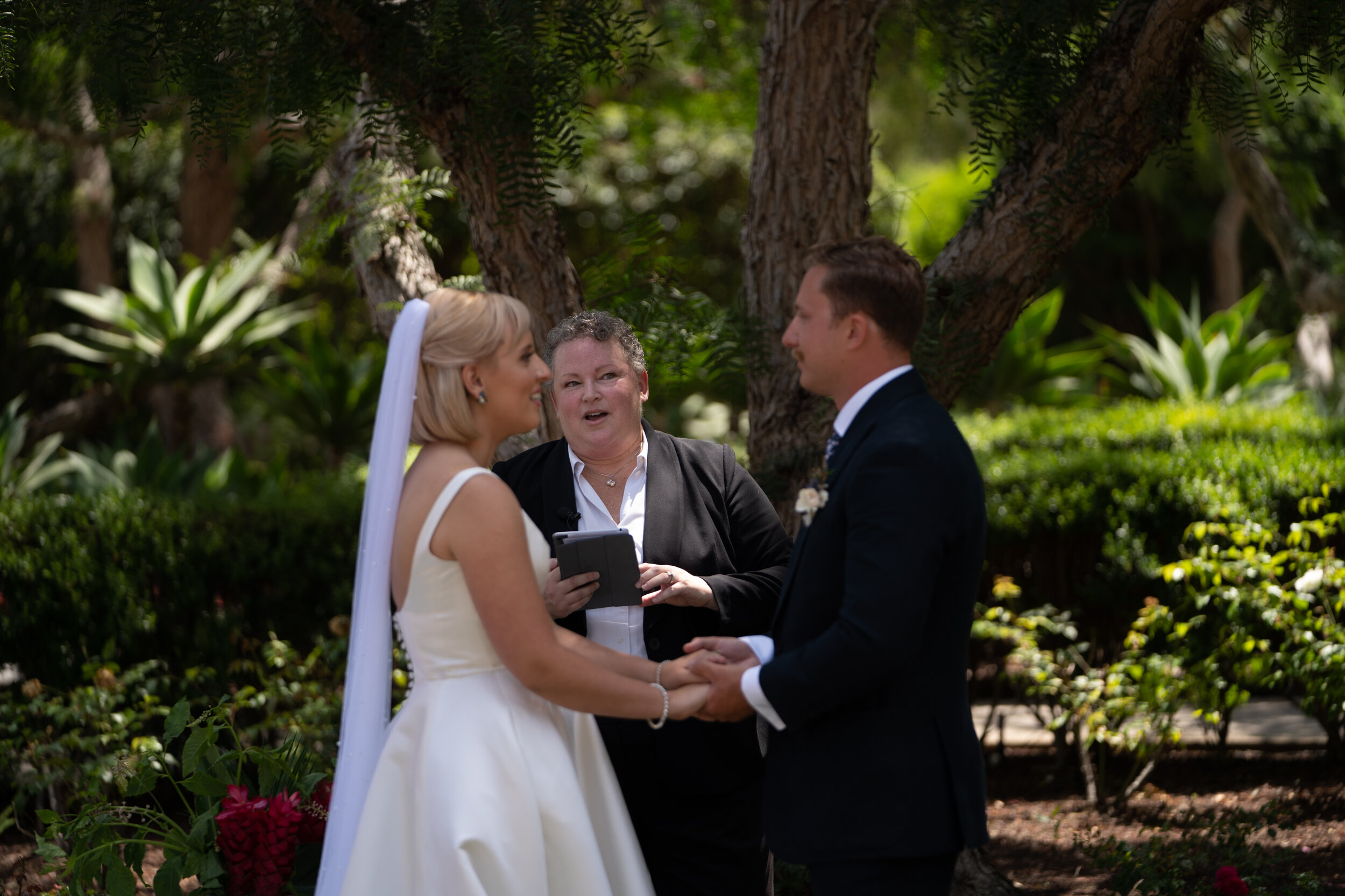 Couple with Officiant Beth Nathan