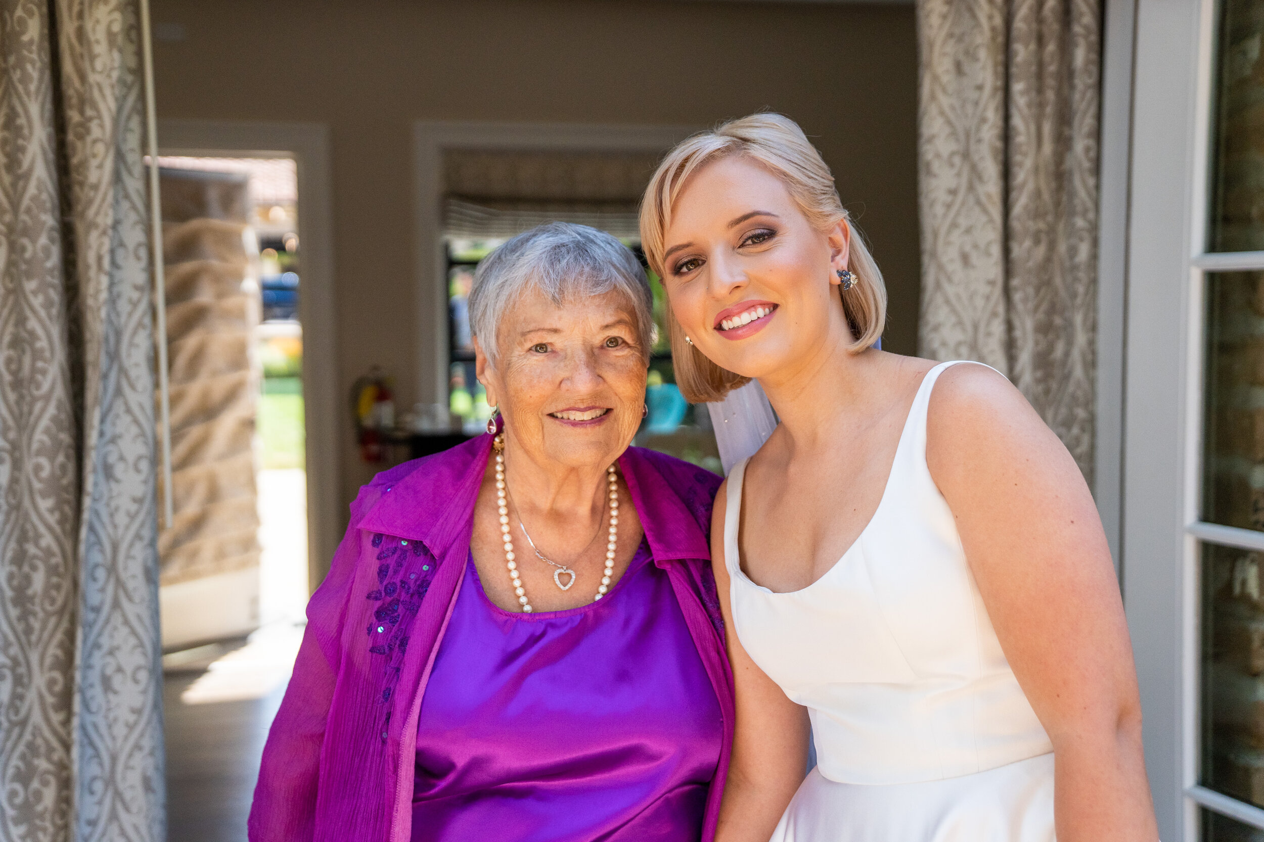 The Bride and her Grandmother share a special moment before the ceremony