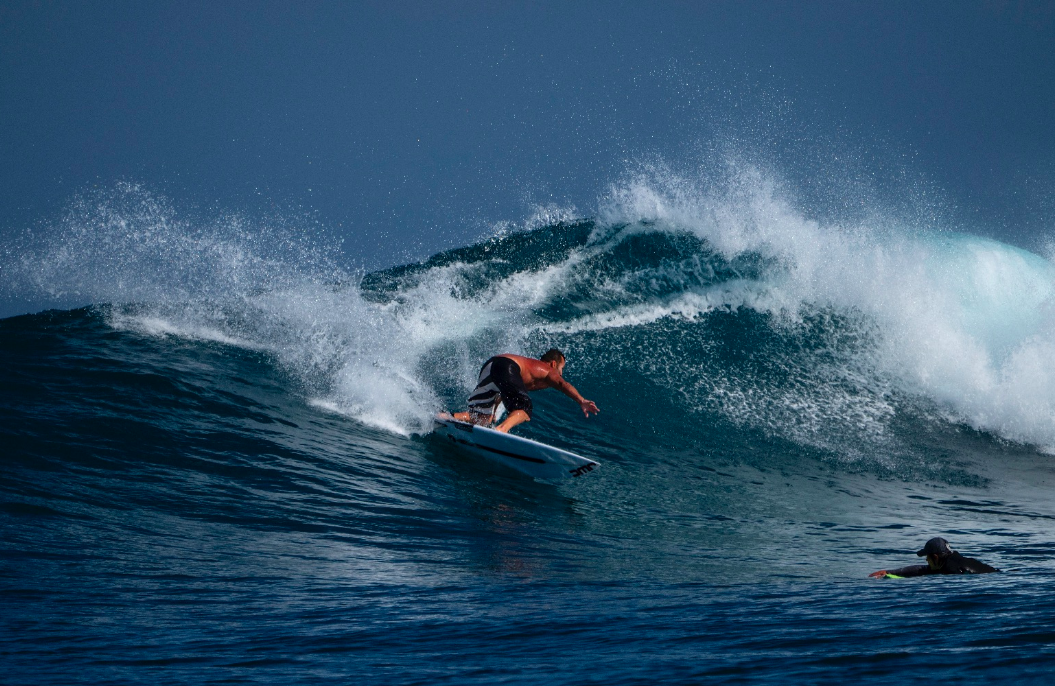 Surf Coach Justin West cutting shapes on one of Madagascar Surf Resort’s empty breaks