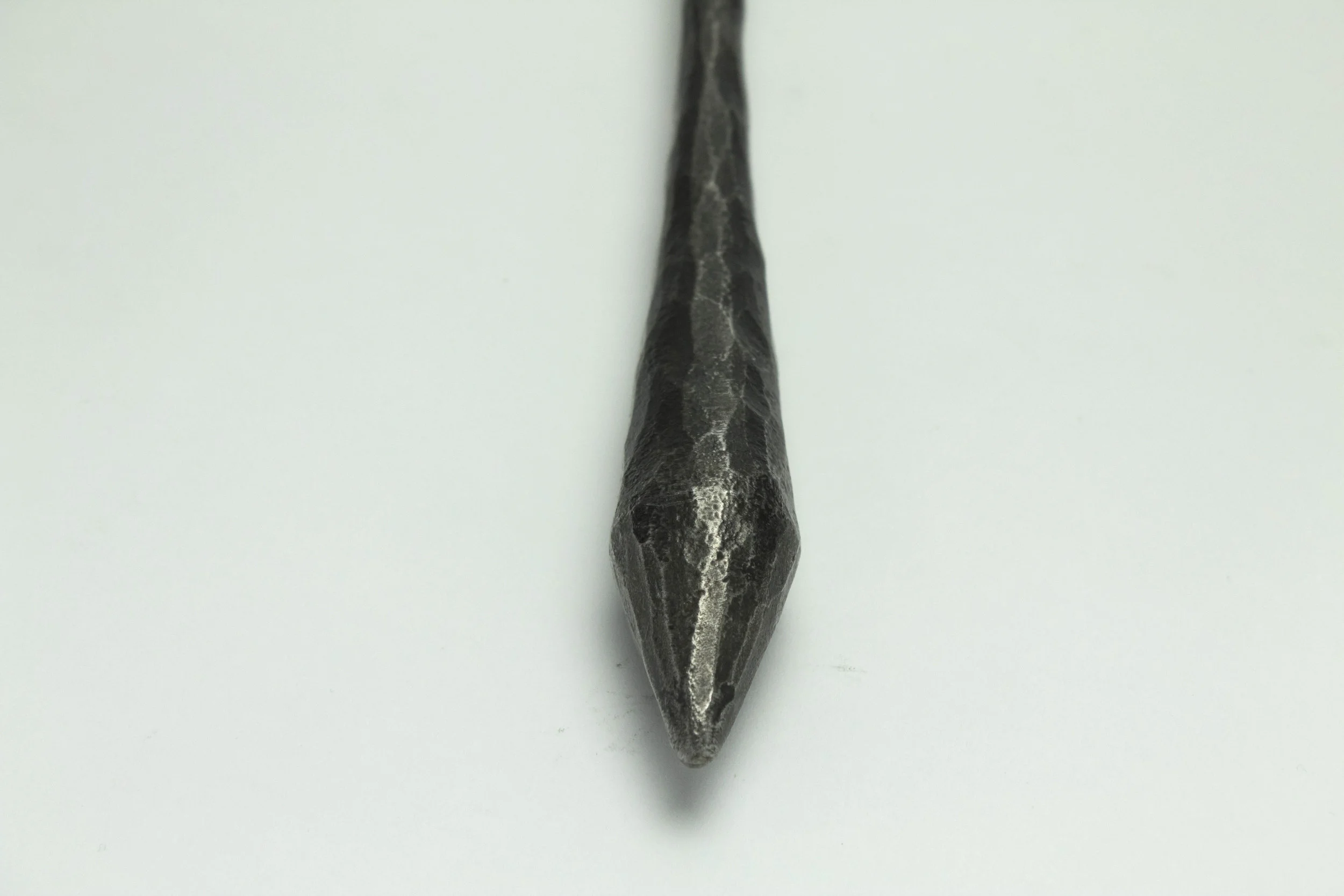 Fire poker welded point