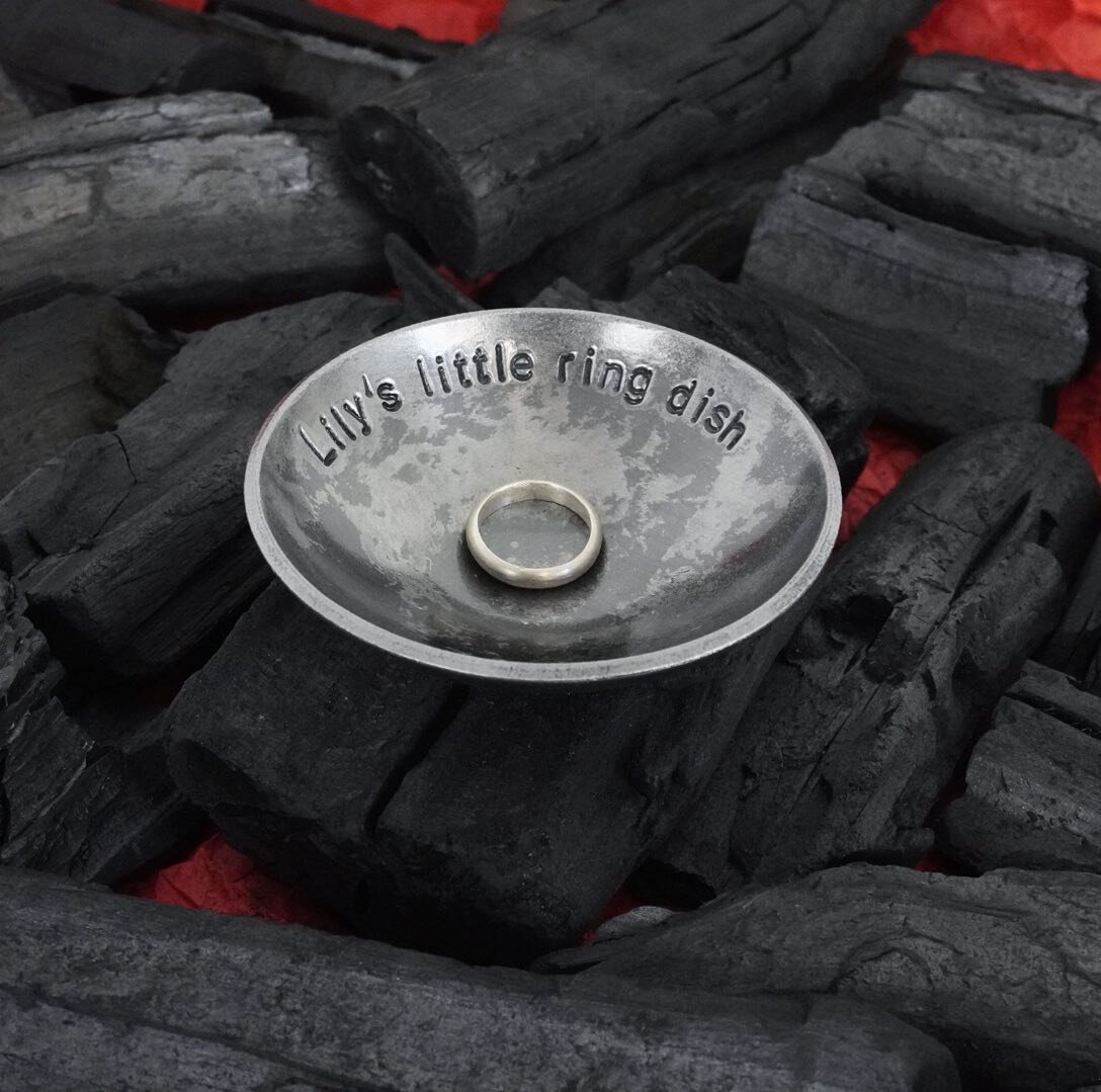 A Personalised Ring Dish. Hand Stamped with a Custom Message of your Choice! 
These are very Popular as Gifts. 
Available Now! 
Product Tagged in Photo.
Etsy Shop Link In Profile! 

#etsybestseller #ringdish #forged #handmadegiftideas #giftideas #pre