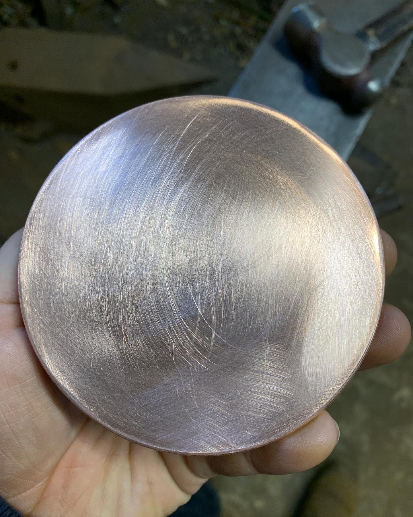 A Blank Copper Canvas. 
Ready to be Personalised and worked into a Dish. 
The work starts even before this stage. I cut the copper sheet into a Circle, sand the edges smooth and take out pre existing scratches. 

#copper #copperblank #coppersheet #co