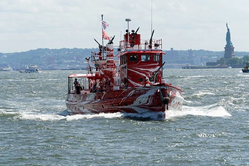 The John J Harvey has been dazzled! This summer, multidisciplanary artist Tauba Auerbach, evoking the DAZZLE camaflouge patterns painted on WWI and WWII vessels to confuse enemy U-boats, has unveiled New York's own 21st-century dazzle ship; John J. Harvey. 