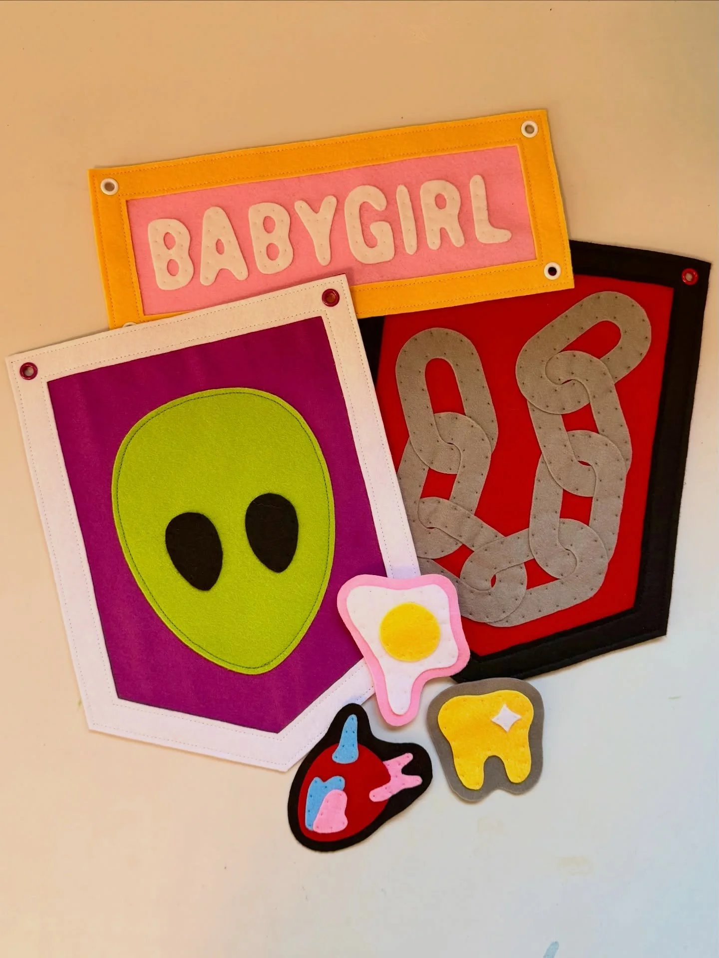 Finished up some new felt goodies for the @chimeratulsa art market on Saturday! There are 14 felt banners and 10 felt patches that&rsquo;ll be for sale along with all of my other items. 👽✨

I&rsquo;ll be adding whatever doesn&rsquo;t sell to my webs