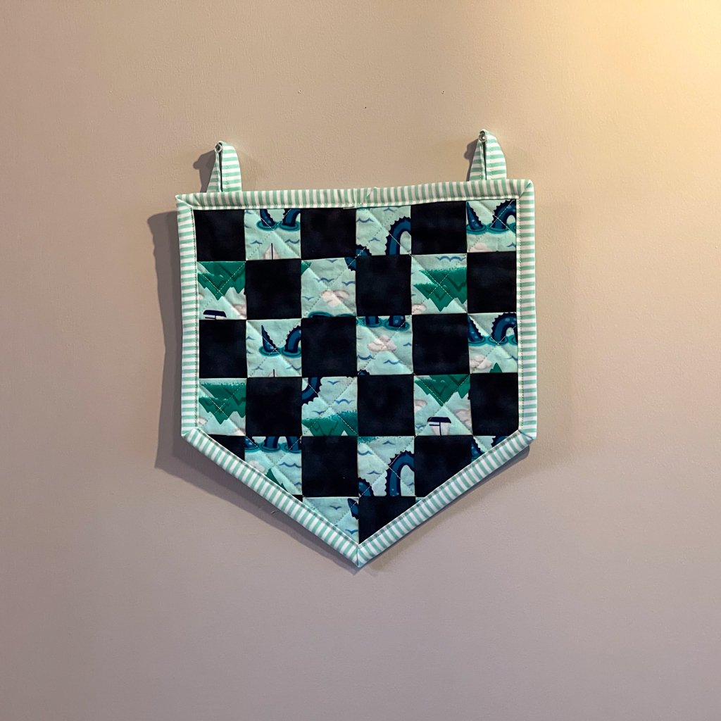 Quilted Checkered Nessie Banner