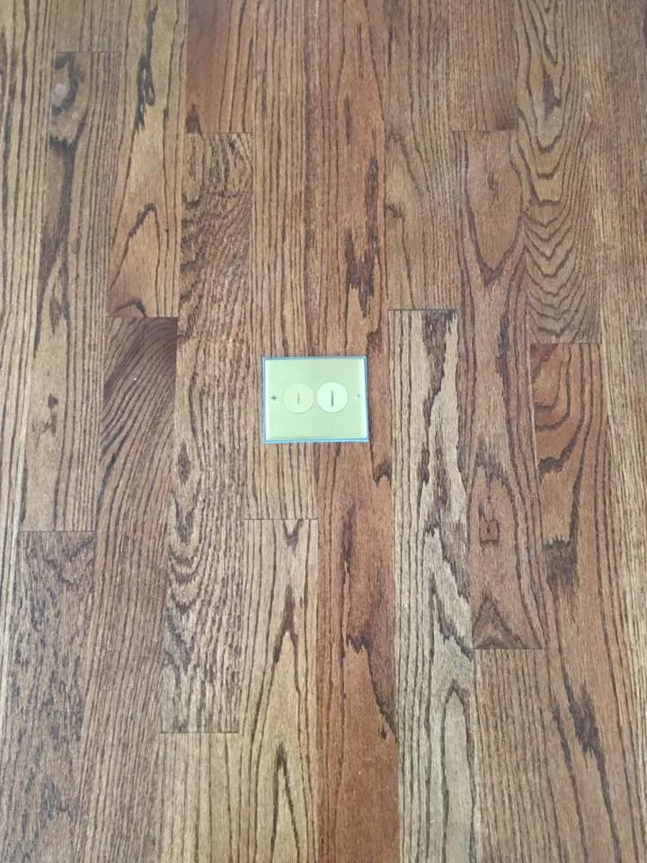 Floor Plug Installed on Finished Oak Floor