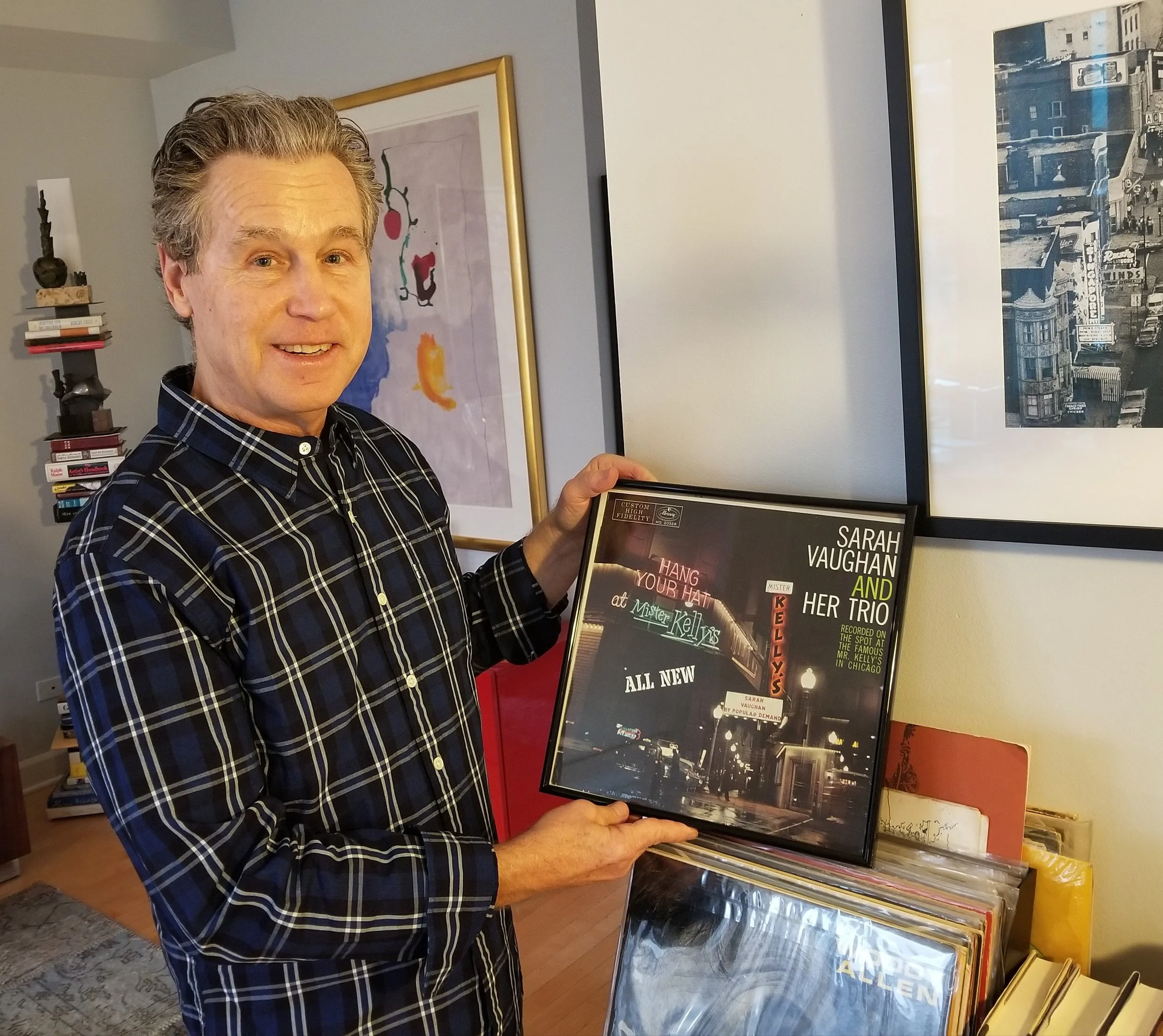 David Marienthal holding Sarah Vaughan live album recorded at Mister Kelly's