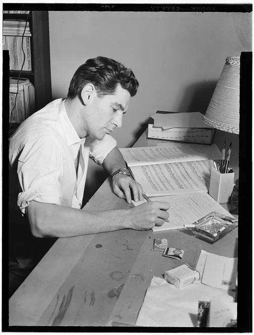 Leonard Bernstein in his New York apartment between 1946-48. Photo by William Gottlieb.