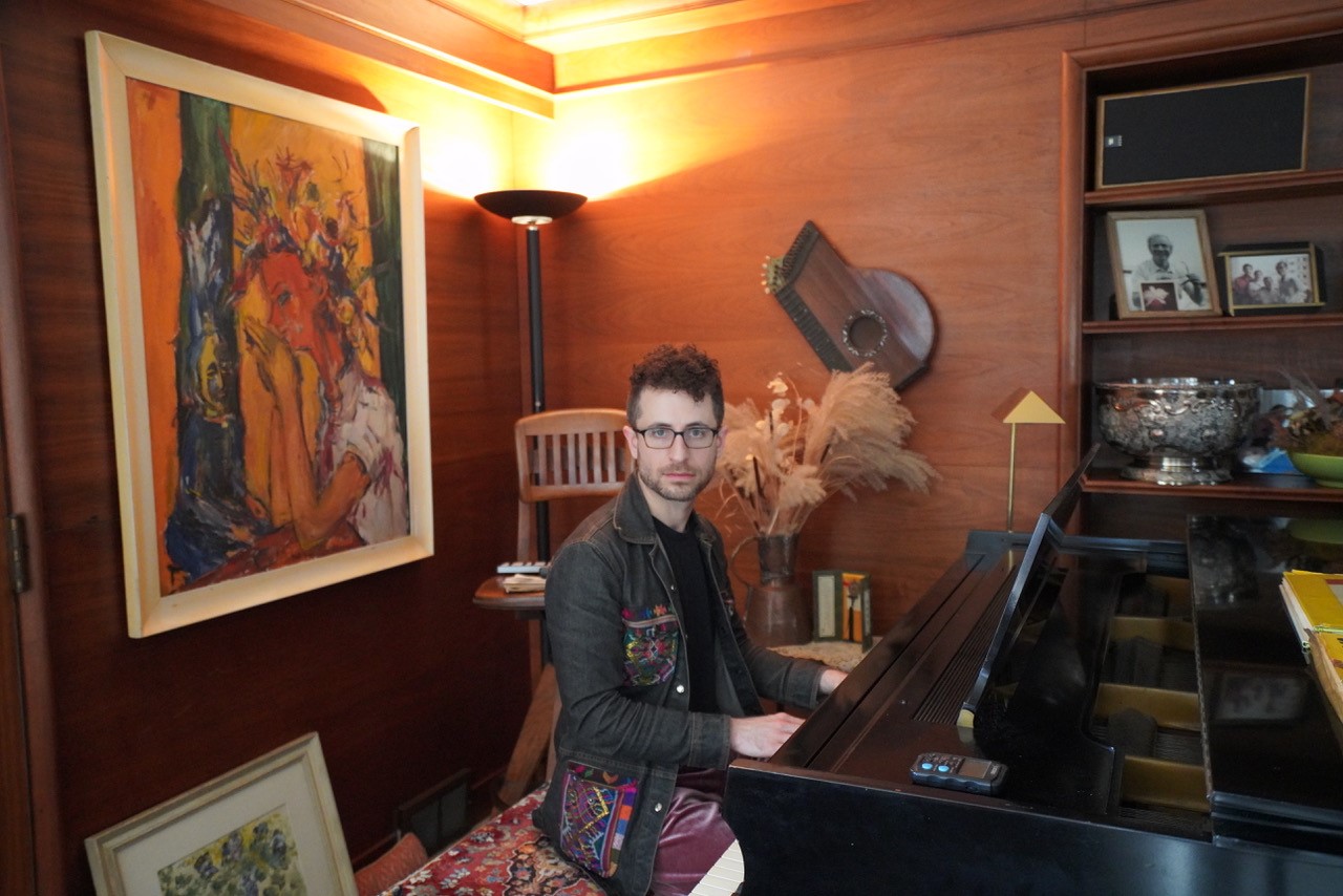 Greg Spero at the piano he played as a child at his grandparents' Highland Park home.