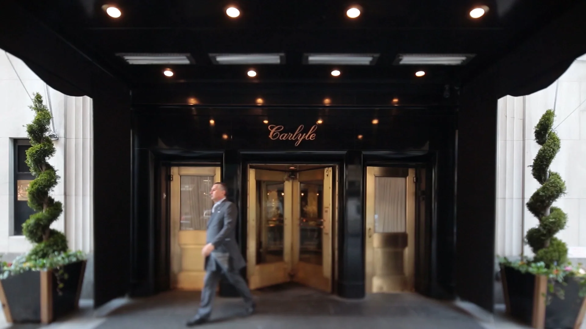 Doorman leaving front entrace.jpg