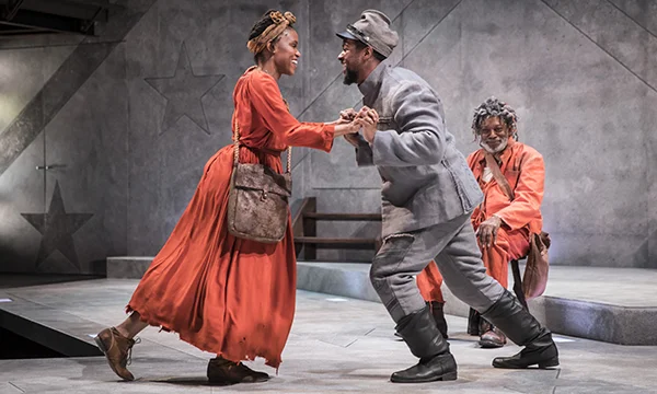 Aimé Donna Kelly (Penny), Kamal Angelo Bolden (Hero/Ulysses) and Ernest Perry Jr. (The Oldest Old Man) in "Father Comes Home from the Wars (Parts 1, 2 & 3)". Image courtesy of Goodman Theatre.