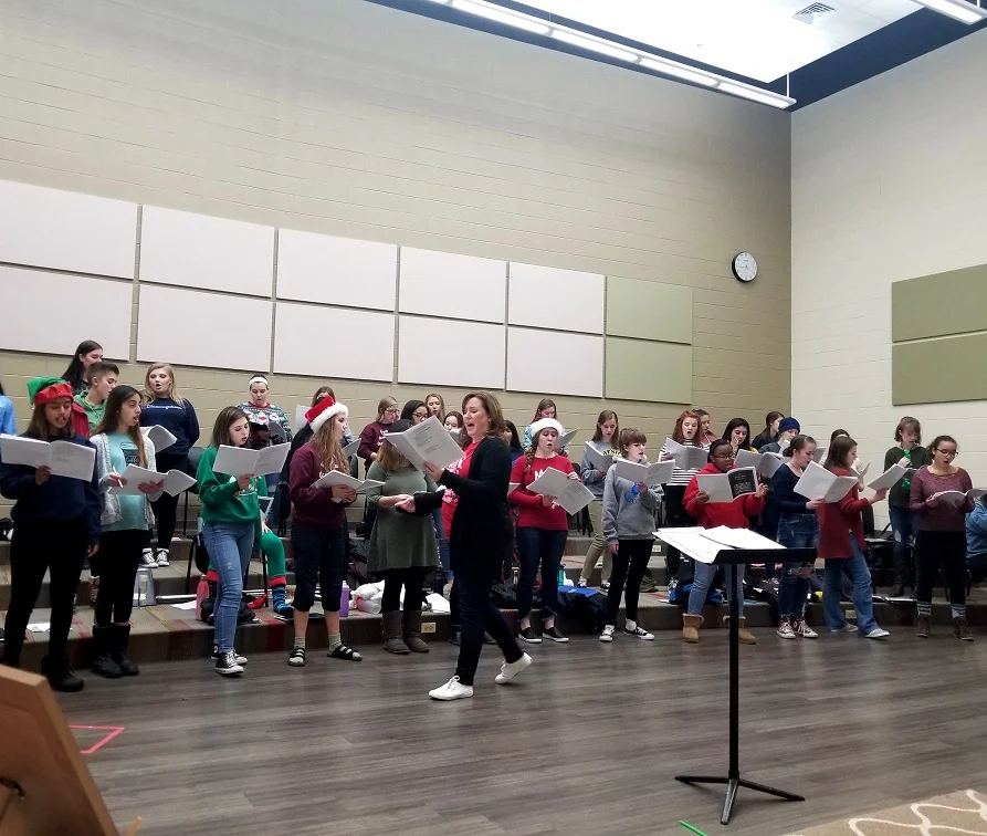 Young Naperville SIngers Artistic Director Angie Johnson leading rehearsal
