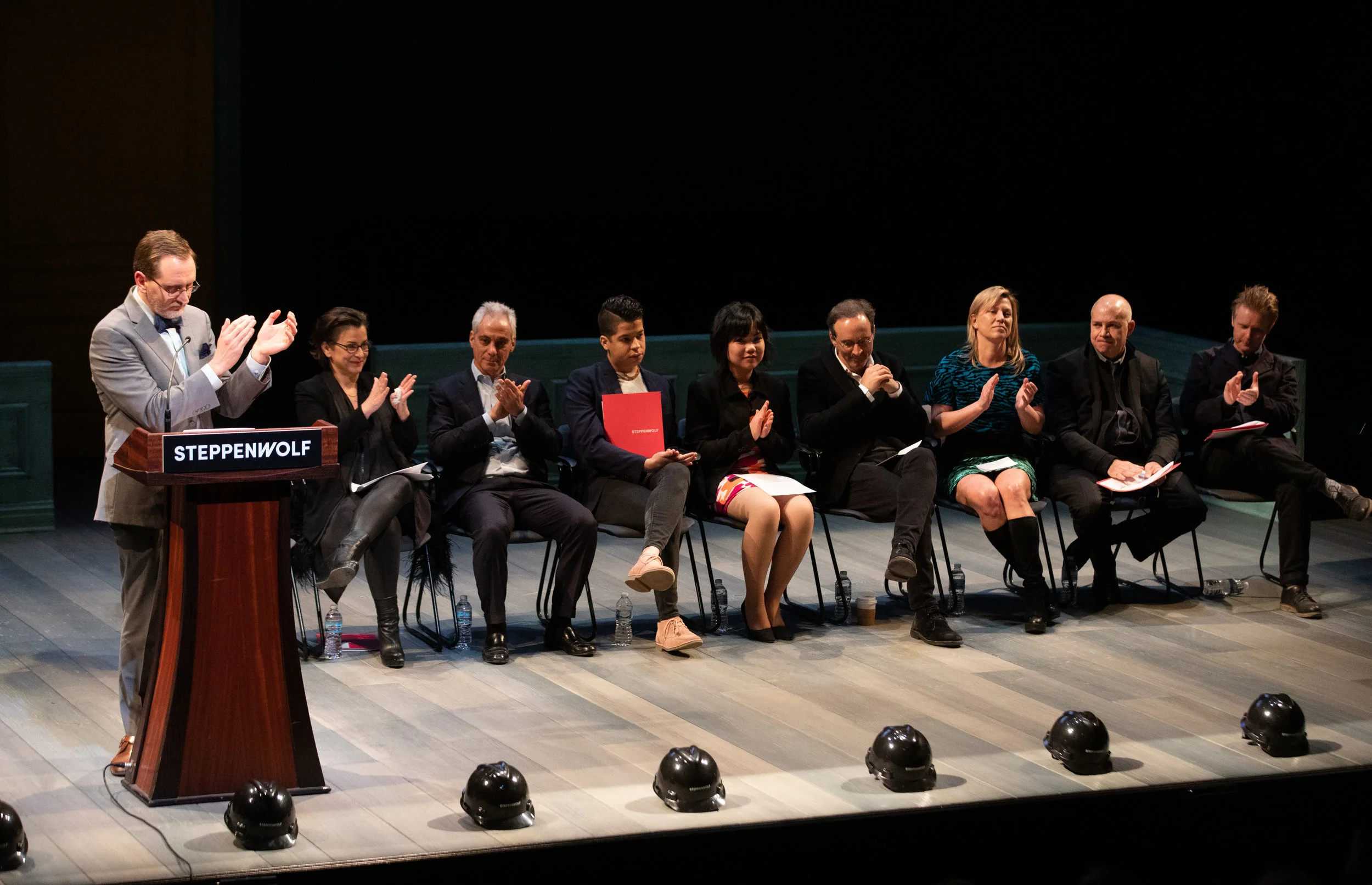 Steppenwolf Executive Director David Schmitz shares remarks at the company’s groundbreaking event. Pictured on stage with David (L to R): Artistic Director and ensemble member Anna D.Shapiro, Mayor Rahm Emanuel, Steppenwolf Young Adult Council alum Brandon Rivera and current member Maiya Swedberg, Campaign Co-Chairs Eric Lefkofsky & Nora Daley, Gordon Gill architect with Adrian Smith + Gordon Gill Architecture, and Gavin Green theater designer. Photo Credit: Kyle Flubacker