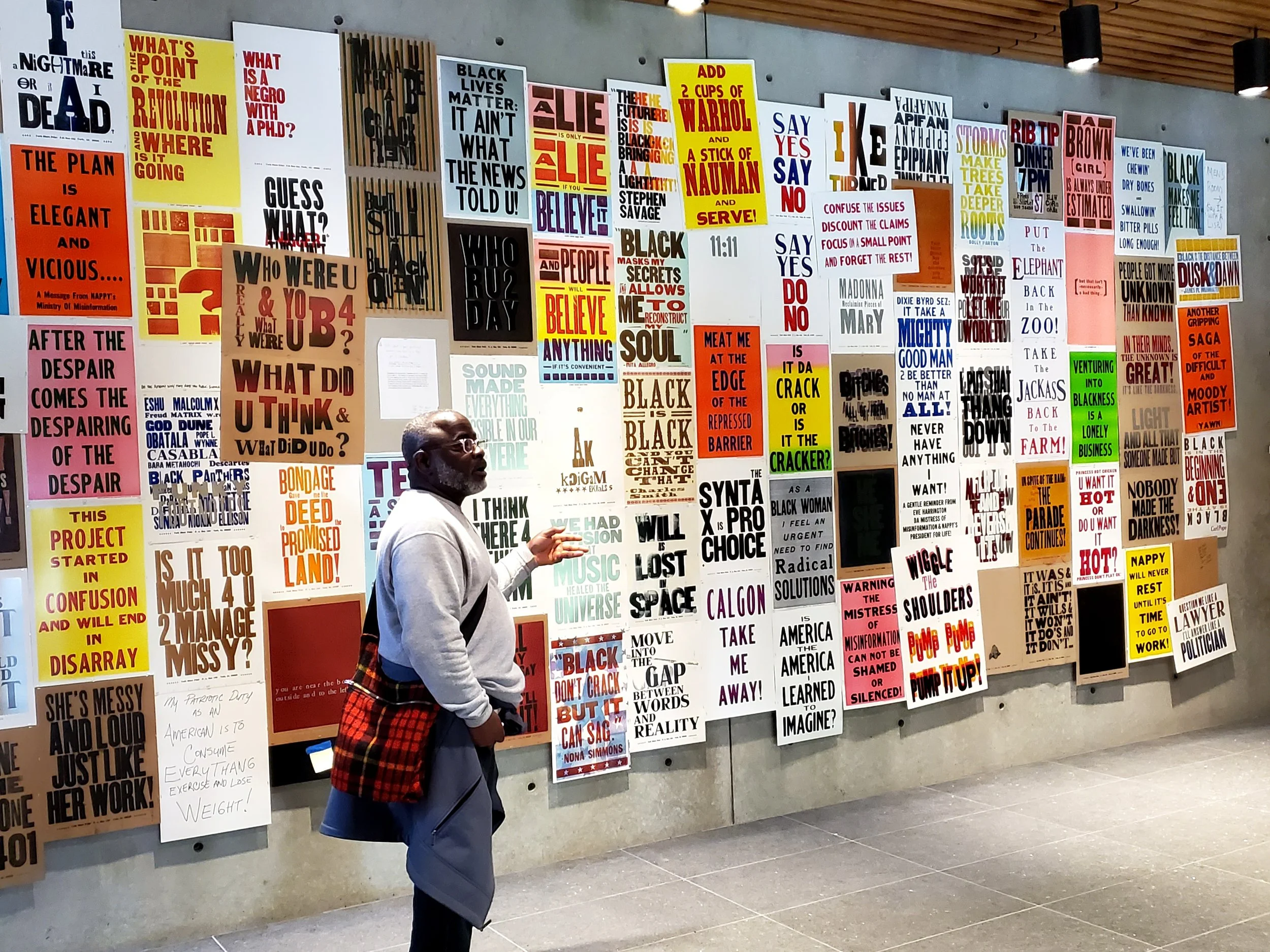 Artist Carl Pope with his installation THE BAD AIR SMELLED OF ROSES
