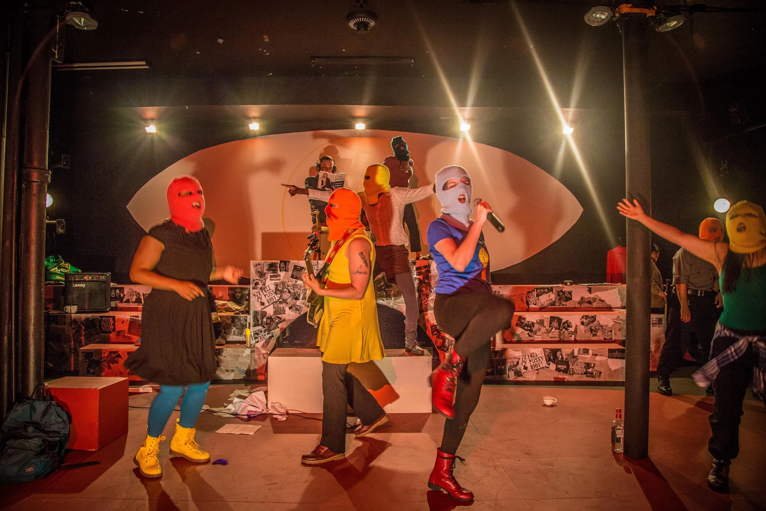 (from left to right) Jalyn Greene, Casey Chapman, Emilie Modaff, Dionne Addai, Nora King, Emily Nichelson, Alec Phan, Stephanie Shum in Red Tape Theatre’s WE ARE PUSSY RIOT (OR EVERYTHING IS P.R.)