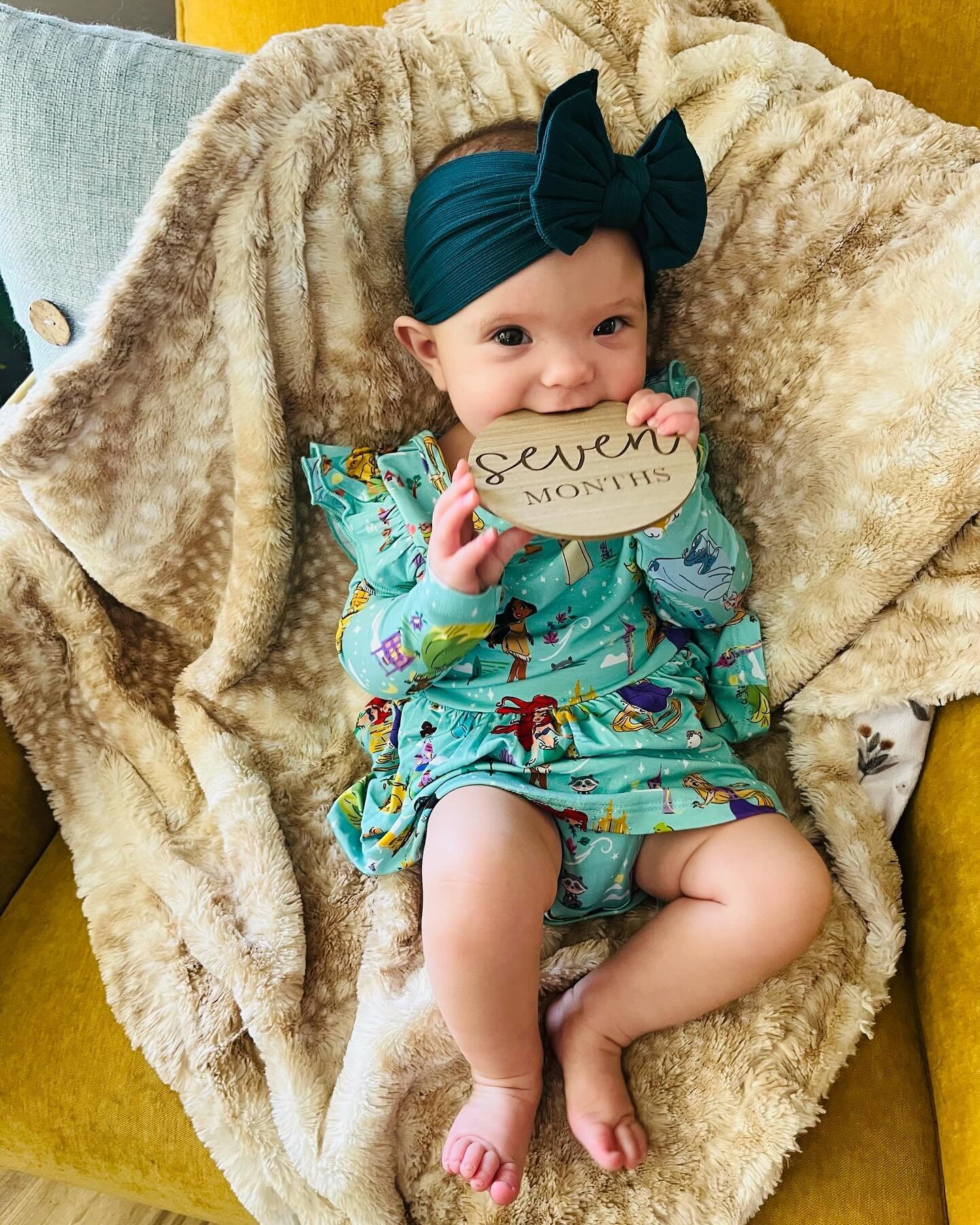 Princess Louisa James turned 7mo on 2/5! This month has brought so much more wiggling, rolling &amp; &ldquo;talking&rdquo;. She loves eating her own toes, blowing bubbles, and petting her favorite kitty, Luna. Her whole face lights up when she smiles