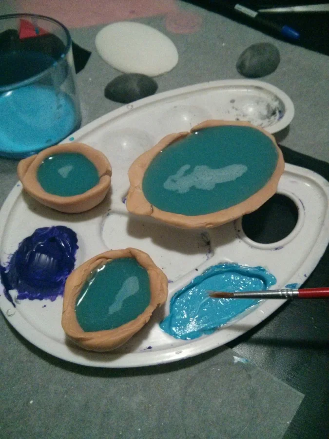 I had tried 3 different types of paint for this and the 2 of them didn't mix with the resin. One of the online guides said "acrylic paint" which I used and it was good. It looked flat and opaque but once it dried it turned transparent.
