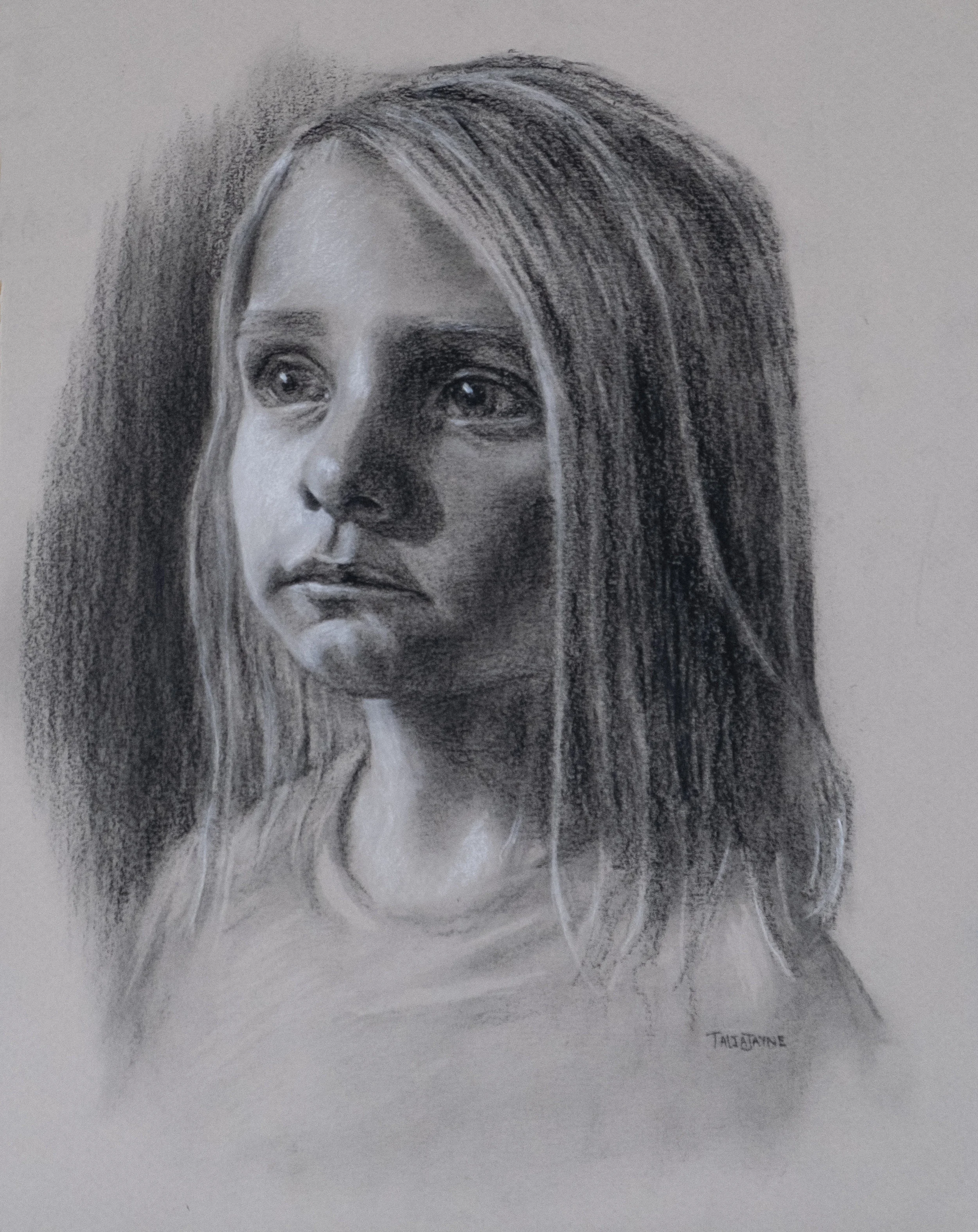 Charcoal and White chalk portrait drawing on toned paper.