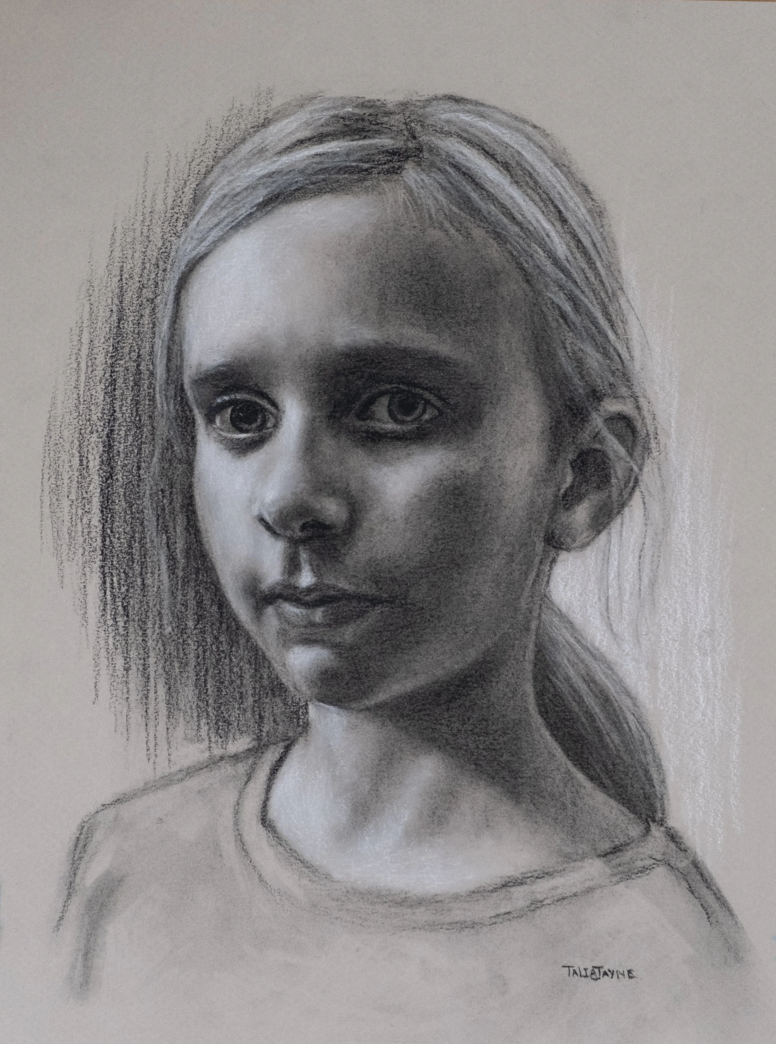 Charcoal and White chalk portrait drawing on toned paper.