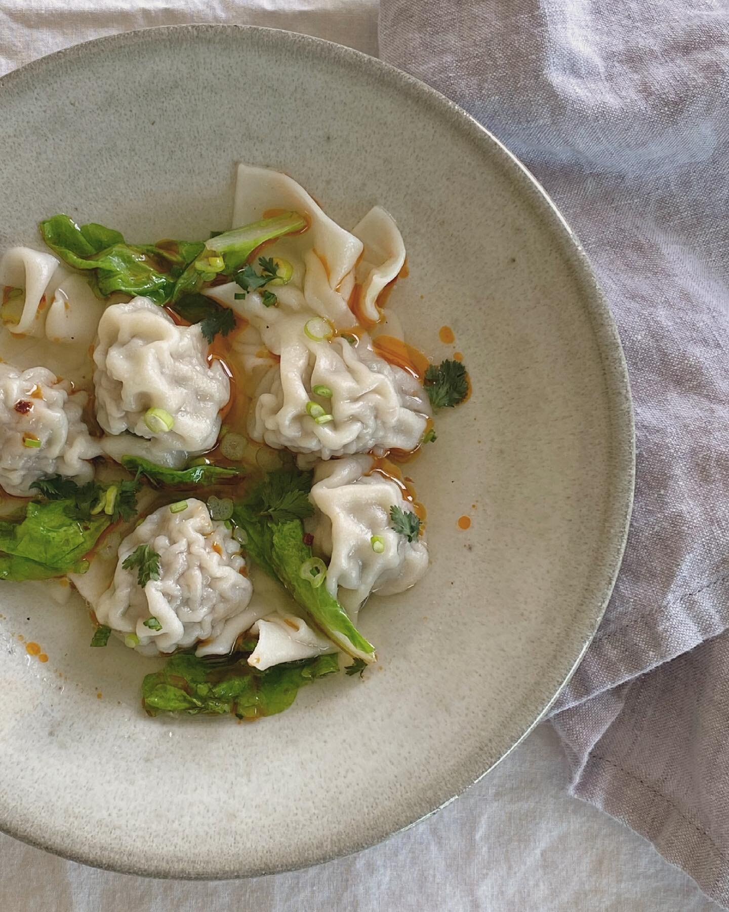 Made wontons from scratch. Most of the ingredients are from @villagefarmstand . @russellroadfarm Mangalitsa ground pork, @epiphanyfarms green garlic in acorn fed Iberico pork consomm&eacute; w/ @downriverfarm baby Chinese cabbage and chili oil.