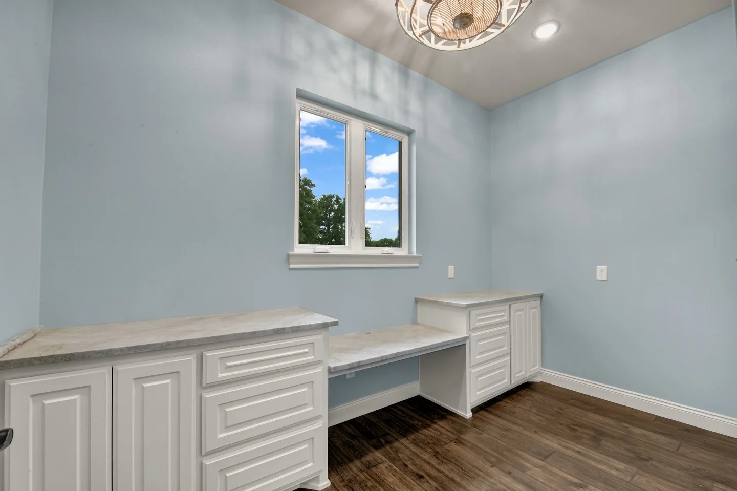 One of the best parts of building custom? Creating spaces for the things you love.

We designed these custom cabinets to give our client a dedicated sewing space&mdash;perfect for her machine, supplies, and projects. A home should work for your lifes