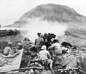 37mm_Gun_fires_against_cave_positions_at_Iwo_Jima.jpg