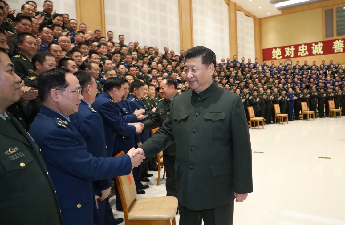 Xi greeting the Chinese military (Source: Xinhua news )