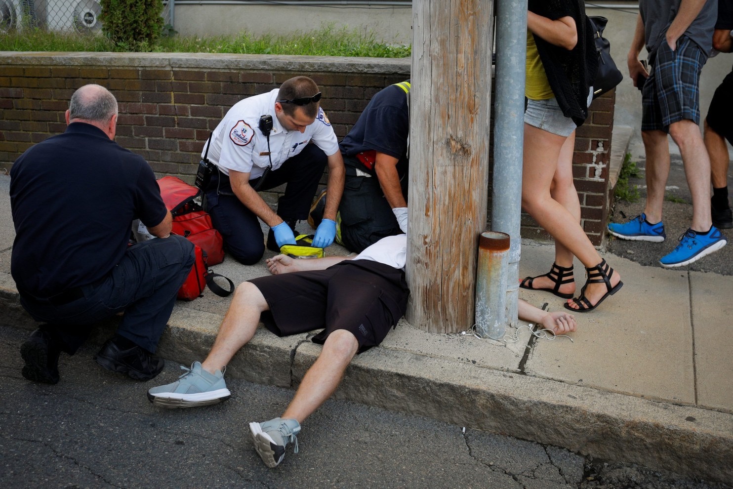 First Responders Revive a Man after an Opioid Overdose. (Source: Brian Snyder/Reuters)