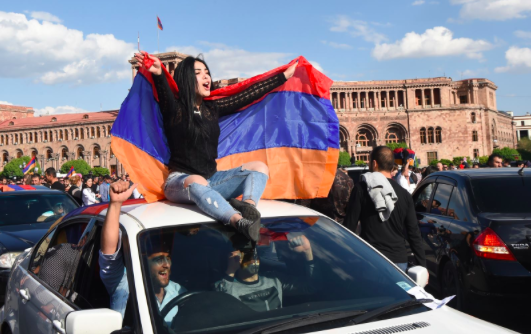 Armenians celebrate the resignation of Prime Minister Serzh Sarksyan in downtown Yerevan on Apr. 23, 2018. Photo: Hayk Baghdasaryan (EPA-EFE)