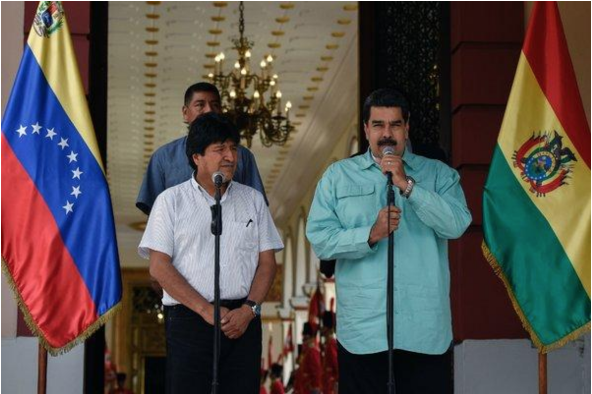 Photo: Current Venezuelan President Nicolás Maduro with closest ally in President Evo Morales of Bolivia Source: Federico Parra/Agence France-Presse — Getty Images