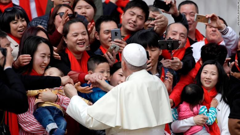 Pope Francis, head of the Catholic Church, greets Chinese faithful at the end of his weekly general audience in St. Peter’s Square in Vatican City on April 18, 2018. Credit: Gregorio Borgia/AP