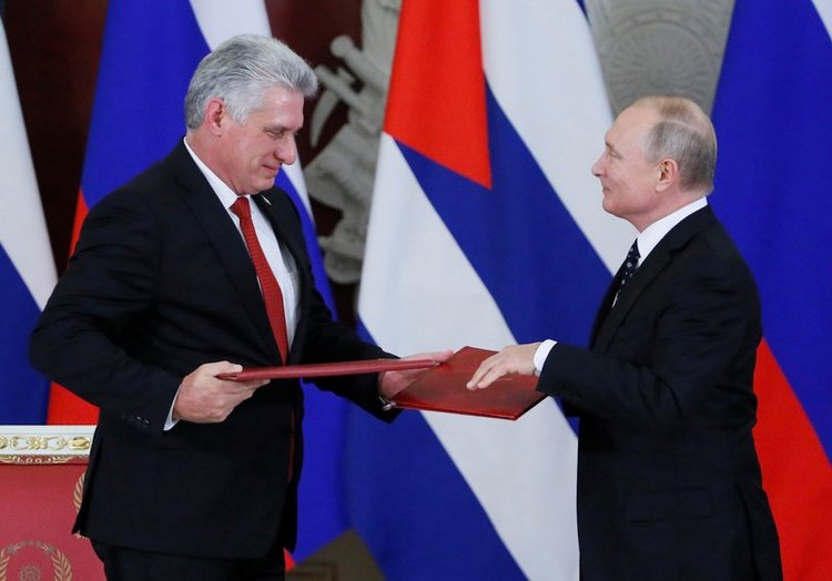 Russian President Putin and Cuban President Diaz-Canel at a joint press conference following their meeting in Moscow. Credit: Business Insider