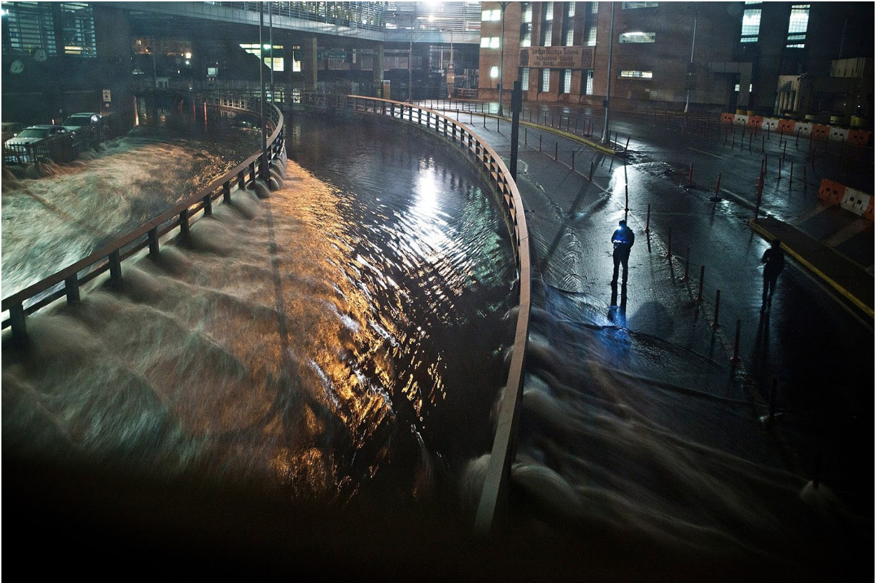Flooding in the Financial District of New York City during Hurricane Sandy, a 2012 hurricane that flooded many neighborhoods in New York. Photo: Andrew Burton/ Getty Images