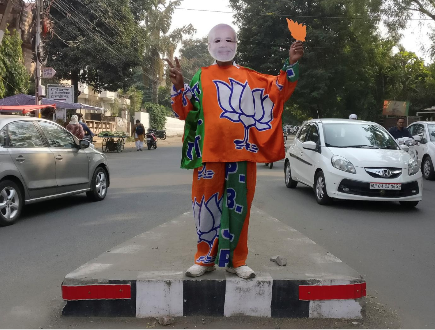 A supporter of the BJP party dresses as Prime Minister Modi in Bhopal, Madhya Pradesh, India. Photo: Rajendra Jadha/Reuters