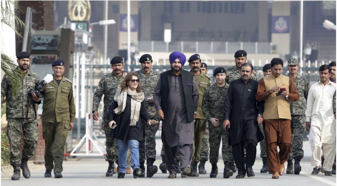 Provincial Minister Sidhu attending the inauguration ceremony in Pakistan. Photo: KM Chaudary/AP .